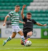 6 August 2023; Liam Burt of Shamrock Rovers in action against Joshua Honohan of Cork City during the SSE Airtricity Men's Premier Division match between Shamrock Rovers and Cork City at Tallaght Stadium in Dublin. Photo by Seb Daly/Sportsfile