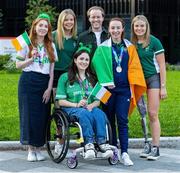 6 August 2023; Ellen Keane of Ireland poses for a photograph with friends, from left, Laura Murphy, Beth Gardiner, Ailbhe Kelly, Max Doyle and Amy Sheridan after day seven of the World Para Swimming Championships 2023 at Manchester Aquatics Centre in Manchester. Photo by Paul Greenwood/Sportsfile