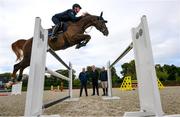 7 August 2023; Tom Wachman on Mangoon jump clear during a tour of Karlswood by Thomas Byrne, TD, Minister of State at the Department of Tourism, Culture, Arts, Gaeltacht, Sport and Media at the Department of Education, Denis Duggan, CEO of Horse Sport Ireland, and Irish Olympian and international showjumper, Cian O'Connor. Photo by Ray McManus/Sportsfile