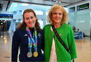 7 August 2023; The 2023 Irish World Para Swimming Championships Gold and Silver medalist Róisín Ní Riain poses for a photograph with her mother Marian Conroy at Dublin Airport on Team Ireland's return from the 2023 World Para Swimming Championships in Manchester. Photo by Tyler Miller/Sportsfile