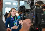 7 August 2023; The 2023 Irish World Para Swimming Championships Gold and Silver medalist Róisín Ní Riain is interviewed for the media at Dublin Airport on Team Ireland's return from the 2023 World Para Swimming Championships in Manchester. Photo by Tyler Miller/Sportsfile