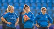 7 August 2023; Leinster players, from left, Meabh O'Brien, Niamh Byrne and Katie Whelan during a Leinster rugby women's training session at Energia Park in Dublin. Photo by Seb Daly/Sportsfile