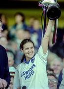 1 October 1995; Waterford captain Noirin Walsh lifts the trophy after the All-Ireland Senior Ladies Football Championship Final between Monaghan and Waterford at Croke Park in Dublin. Photo by Brendan Moran/Sportsfile