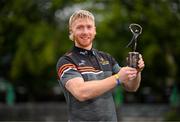 10 August 2023; PwC GAA/GPA Player of the Month for July in hurling, Cian Lynch of Limerick, with his award at PwC offices in Limerick. Photo by Stephen McCarthy/Sportsfile