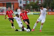 10 August 2023; Michael Duffy of Derry City, centre, in action against Serges Déblé, left, and Islam Chesnokov of Tobol during the UEFA Europa Conference League Third Qualifying Round First Leg match between Tobol and Derry City at Kostanay Central Stadium in Kostanay, Kazakhstan. Photo by Kaskyrbai Koishymanov/Sportsfile