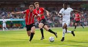 10 August 2023; Serge Déblé of Tobol in action against Ronan Boyce, left, and Cameron McJannet of Derry City during the UEFA Europa Conference League Third Qualifying Round First Leg match between Tobol and Derry City at Kostanay Central Stadium in Kostanay, Kazakhstan. Photo by Kaskyrbai Koishymanov/Sportsfile