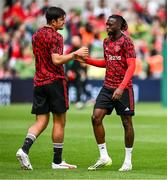 6 August 2023; Harry Maguire, left, and Aaron Wan-Bissaka of Manchester United before the pre-season friendly match between Manchester United and Athletic Bilbao at the Aviva Stadium in Dublin. Photo by Ben McShane/Sportsfile