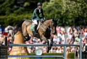 11 August 2023; Michael Pender of Ireland competes on Hhs Calais during the Longines FEI Jumping Nations Cup™ of Ireland international competition during the 2023 Longines FEI Dublin Horse Show at the RDS in Dublin. Photo by David Fitzgerald/Sportsfile