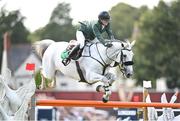 11 August 2023; Shane Sweetnam of Ireland competes on James Kann Cruz during the Longines FEI Jumping Nations Cup™ of Ireland international competition during the 2023 Longines FEI Dublin Horse Show at the RDS in Dublin. Photo by David Fitzgerald/Sportsfile