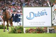 11 August 2023; Samuel Hutton of Great Britain with Oak Grove's Laith after being disqualified during the Longines FEI Jumping Nations Cup™ of Ireland international competition during the 2023 Longines FEI Dublin Horse Show at the RDS in Dublin. Photo by David Fitzgerald/Sportsfile