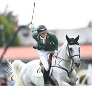 11 August 2023; Michael Duffy of Ireland celebrates on Cinca 3 after his ride in the Longines FEI Jumping Nations Cup™ of Ireland international competition during the 2023 Longines FEI Dublin Horse Show at the RDS in Dublin. Photo by David Fitzgerald/Sportsfile