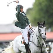 11 August 2023; Michael Duffy of Ireland celebrates on Cinca 3 after his ride in the Longines FEI Jumping Nations Cup™ of Ireland international competition during the 2023 Longines FEI Dublin Horse Show at the RDS in Dublin. Photo by David Fitzgerald/Sportsfile