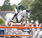 11 August 2023; Michael Duffy of Ireland competes on Cinca 3 during the Longines FEI Jumping Nations Cup™ of Ireland international competition during the 2023 Longines FEI Dublin Horse Show at the RDS in Dublin. Photo by David Fitzgerald/Sportsfile