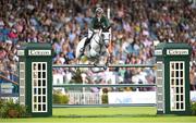 11 August 2023; Michael Duffy of Ireland competes on Cinca 3 during the Longines FEI Jumping Nations Cup™ of Ireland international competition during the 2023 Longines FEI Dublin Horse Show at the RDS in Dublin. Photo by David Fitzgerald/Sportsfile