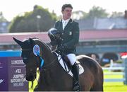 11 August 2023; Michael Pender of Ireland on Hhs Calais after finishing second in the Aga Khan during the Longines FEI Jumping Nations Cup™ of Ireland international competition during the 2023 Longines FEI Dublin Horse Show at the RDS in Dublin. Photo by David Fitzgerald/Sportsfile