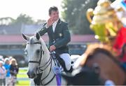 11 August 2023; Shane Sweetnam of Ireland on James Kann Cruz after finishing second in the Aga Khan during the Longines FEI Jumping Nations Cup™ of Ireland international competition during the 2023 Longines FEI Dublin Horse Show at the RDS in Dublin. Photo by David Fitzgerald/Sportsfile