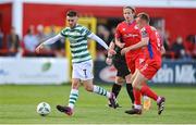 11 August 2023; Dylan Watts of Shamrock Rovers in action against Jonathan Lunney of Shelbourne during the SSE Airtricity Men's Premier Division match between Shelbourne and Shamrock Rovers at Tolka Park in Dublin. Photo by Seb Daly/Sportsfile