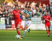 11 August 2023; Harry Wood of Shelbourne in action against Daniel Cleary of Shamrock Rovers during the SSE Airtricity Men's Premier Division match between Shelbourne and Shamrock Rovers at Tolka Park in Dublin. Photo by John Sheridan/Sportsfile
