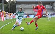 11 August 2023; Dylan Watts of Shamrock Rovers in action against Will Jarvis of Shelbourne during the SSE Airtricity Men's Premier Division match between Shelbourne and Shamrock Rovers at Tolka Park in Dublin. Photo by Seb Daly/Sportsfile