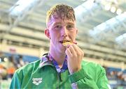 11 August 2023; Daniel Wiffen of Ireland celebrates with his gold medal after winning the men's 1500m freestyle <STAGE> during day one of the European U23 Swimming Championships at the National Aquatic Centre in Dublin. Photo by Tyler Miller/Sportsfile