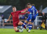 11 August 2023; Killian Brouder of Galway United in action against Barry Baggley of Waterford during the SSE Airtricity Men's First Division match between Waterford and Galway United at RSC in Waterford. Photo by Michael P Ryan/Sportsfile