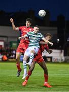 11 August 2023; Gary O'Neill of Shamrock Rovers in action against Shelbourne players Jad Hakiki, left, and Gbemi Arubi during the SSE Airtricity Men's Premier Division match between Shelbourne and Shamrock Rovers at Tolka Park in Dublin. Photo by Seb Daly/Sportsfile
