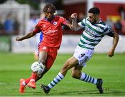 11 August 2023; Gbemi Arubi of Shelbourne in action against Roberto Lopes of Shamrock Rovers during the SSE Airtricity Men's Premier Division match between Shelbourne and Shamrock Rovers at Tolka Park in Dublin. Photo by Seb Daly/Sportsfile