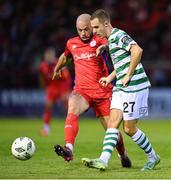 11 August 2023; Liam Burt of Shamrock Rovers in action against Mark Coyle of Shelbourne during the SSE Airtricity Men's Premier Division match between Shelbourne and Shamrock Rovers at Tolka Park in Dublin. Photo by Seb Daly/Sportsfile