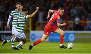 11 August 2023; Jack Moylan of Shelbourne in action against Roberto Lopes of Shamrock Rovers during the SSE Airtricity Men's Premier Division match between Shelbourne and Shamrock Rovers at Tolka Park in Dublin. Photo by Seb Daly/Sportsfile
