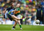 30 July 2023; Lily Monahan, Scoil Naomh Iósaf, Baltinglass, Wicklow, representing Dublin, in action against Bláithín Mallon, Moneynick PS, Randalstown, Antrim, representing Kerry, during the INTO Cumann na mBunscol GAA Respect Exhibition Go Games at the GAA Football All-Ireland Senior Championship final match between Dublin and Kerry at Croke Park in Dublin. Photo by Eóin Noonan/Sportsfile