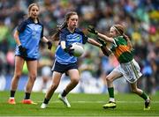 30 July 2023; Lily Monahan, Scoil Naomh Iósaf, Baltinglass, Wicklow, representing Dublin, in action against Bláithín Mallon, Moneynick PS, Randalstown, Antrim, representing Kerry, during the INTO Cumann na mBunscol GAA Respect Exhibition Go Games at the GAA Football All-Ireland Senior Championship final match between Dublin and Kerry at Croke Park in Dublin. Photo by Eóin Noonan/Sportsfile