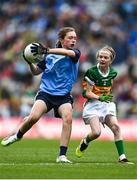 30 July 2023; Lily Monahan, Scoil Naomh Iósaf, Baltinglass, Wicklow, representing Dublin, in action against Bláithín Mallon, Moneynick PS, Randalstown, Antrim, representing Kerry, during the INTO Cumann na mBunscol GAA Respect Exhibition Go Games at the GAA Football All-Ireland Senior Championship final match between Dublin and Kerry at Croke Park in Dublin. Photo by Eóin Noonan/Sportsfile