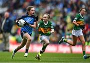 30 July 2023; Lily Monahan, Scoil Naomh Iósaf, Baltinglass, Wicklow, representing Dublin, in action against Bláithín Mallon, Moneynick PS, Randalstown, Antrim, representing Kerry, during the INTO Cumann na mBunscol GAA Respect Exhibition Go Games at the GAA Football All-Ireland Senior Championship final match between Dublin and Kerry at Croke Park in Dublin. Photo by Eóin Noonan/Sportsfile