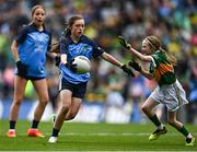 30 July 2023; Lily Monahan, Scoil Naomh Iósaf, Baltinglass, Wicklow, representing Dublin, in action against Bláithín Mallon, Moneynick PS, Randalstown, Antrim, representing Kerry, during the INTO Cumann na mBunscol GAA Respect Exhibition Go Games at the GAA Football All-Ireland Senior Championship final match between Dublin and Kerry at Croke Park in Dublin. Photo by Eóin Noonan/Sportsfile