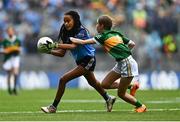 30 July 2023; Ciara Lane, Saint Attracta's Senior NS, Dundrum, Dublin, representing Dublin, in action against Amelie O'Sullivan, Scoil Eoin, Baloonogh, Tralee, Kerry, representing Kerry, during the INTO Cumann na mBunscol GAA Respect Exhibition Go Games at the GAA Football All-Ireland Senior Championship final match between Dublin and Kerry at Croke Park in Dublin. Photo by Eóin Noonan/Sportsfile
