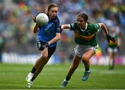 30 July 2023; Lily Monahan, Scoil Naomh Iósaf, Baltinglass, Wicklow, representing Dublin, in action against Lauren Morley, Carnmore NS, Oranmore, Galway, representing Kerry, during the INTO Cumann na mBunscol GAA Respect Exhibition Go Games at the GAA Football All-Ireland Senior Championship final match between Dublin and Kerry at Croke Park in Dublin. Photo by Eóin Noonan/Sportsfile