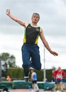 12 August 2023; Richard Phelan of Huntingdonshire AC competing in the men's vet60 long jump during the 123.ie National Masters Track and Field Championships at in Tullamore, Offaly. Photo by Seb Daly/Sportsfile