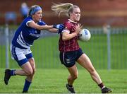 12 August 2023; Shannon McQuade of Tempo Maguires, Fermanagh, in action against Kelly Kearney of Shelmalier’s, Wexford, during the 2023 intermediate championship final at the currentaccount.ie All-Ireland Club 7s tournament at Naomh Mearnog GAA Club in Portmarnock, Dublin. Photo by Stephen Marken/Sportsfile
