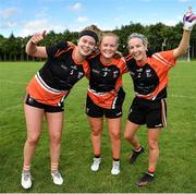 12 August 2023; The Bearna, Galway, players from left, Caoimhe Cleary, Shauna Butler, and Sarah Jane Flaherty celebrate after their side's victory in the 2023 currentaccount.ie All-Ireland Club 7s intermediate shield final at Naomh Mearnog GAA Club in Portmarnock, Dublin. Photo by Stephen Marken/Sportsfile