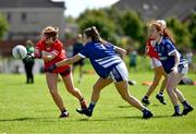 12 August 2023; Sophie McKenna of Newtownbutler First Fermanagh's, Fermanagh, in action against Shelmalier's of Wexford in the intermediate competition at the 2023 currentaccount.ie All-Ireland Club 7s tournament at Naomh Mearnóg GAA Club in Malahide, Dublin. Photo by Piaras Ó Mídheach/Sportsfile