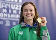 12 August 2023; Mona McSharry of Ireland celebrates with her gold medal after winning the women's 100m breaststroke final during day two of the European U23 Swimming Championships at the National Aquatic Centre in Dublin. Photo by Tyler Miller/Sportsfile