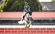 12 August 2023; Richard Howley of Ireland competes on Farianne during the Defender Puissance during the 2023 Longines FEI Dublin Horse Show at the RDS in Dublin. Photo by David Fitzgerald/Sportsfile