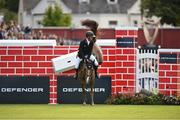 12 August 2023; Alexander Butler of Ireland competes on Pico during the Defender Puissance during the 2023 Longines FEI Dublin Horse Show at the RDS in Dublin. Photo by David Fitzgerald/Sportsfile