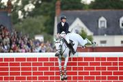 12 August 2023; Jordan Coyle of Ireland jumps 2 metres 20 on Eristov during the Defender Puissance during the 2023 Longines FEI Dublin Horse Show at the RDS in Dublin. Photo by David Fitzgerald/Sportsfile