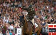 12 August 2023; Commandant Geoff Curran of Ireland celebrates on Bishops Quarter after winning the Defender Puissance during the 2023 Longines FEI Dublin Horse Show at the RDS in Dublin. Photo by David Fitzgerald/Sportsfile