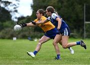 12 August 2023; Claire Hehir of Banner, Clare, left, in action against Heather Spillane of Fethard, Tipperary, during the senior competition at the 2023 currentaccount.ie All-Ireland Club 7s tournament at Naomh Mearnóg GAA Club in Malahide, Dublin. Photo by Piaras Ó Mídheach/Sportsfile