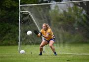 12 August 2023; Helen Hehir of Banner, Clare, makes a save against Fethard of Tipperary during the senior competition at the 2023 currentaccount.ie All-Ireland Club 7s tournament at Naomh Mearnóg GAA Club in Malahide, Dublin. Photo by Piaras Ó Mídheach/Sportsfile