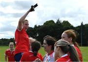 12 August 2023; Sarah Gomley of Kilkerrin Clonberne, Galway, is held aloft by team-mates as they celebrate after beating Glencar–Manorhamilton, Leitrim, to win the senior championship final for the second year in a row at the 2023 currentaccount.ie All-Ireland Club 7s tournament at Naomh Mearnóg GAA Club in Malahide, Dublin. Photo by Piaras Ó Mídheach/Sportsfile
