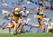 13 August 2023; Caoimhe Harvey of Clare in action against Grace Clifford of Kildare during the 2023 TG4 All-Ireland Ladies Intermediate Football Championship Final match between Clare and Kildare at Croke Park in Dublin. Photo by John Sheridan/Sportsfile