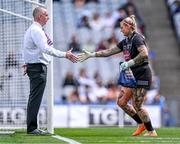 13 August 2023; Kildare goalkeeper Mary Hulgraine shakes hands with umpire Niall McCormack before the 2023 TG4 All-Ireland Ladies Intermediate Football Championship Final match between Clare and Kildare at Croke Park in Dublin. Photo by Piaras Ó Mídheach/Sportsfile